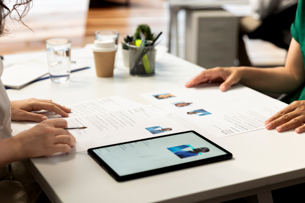 hr-manager-using-device-evaluate-if-applicant-qualifications-match-demands